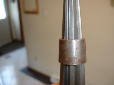 1996 Ford Bronco - Close-up of a metal tool with a ring around its shaft.