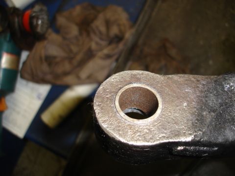 1996 Ford Bronco - A close-up view of a mechanical component, possibly a linkage or bracket, with visible wear and grime.