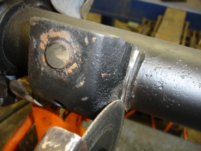 close-up of metal part being cut with a grinder