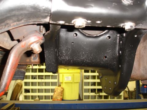 1996 Ford Bronco - Undercarriage view showing suspension components and frame structure.