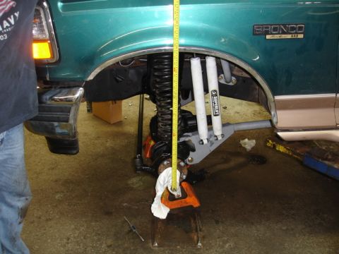 1996 Ford Bronco - Measuring suspension height on a 1996 Ford Bronco during a modification.