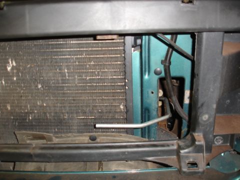 1996 Ford Bronco - Radiator and front-end components of a vehicle, viewed from the front.