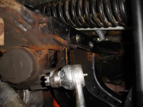 1996 Ford Bronco - Rusted suspension components, likely from an older vehicle, showing significant wear and tear.
