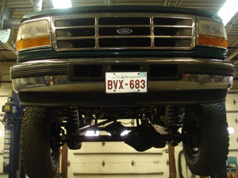 1996 Ford Bronco - Front view of a 1996 Ford Bronco, showing its distinctive grille and headlight design.