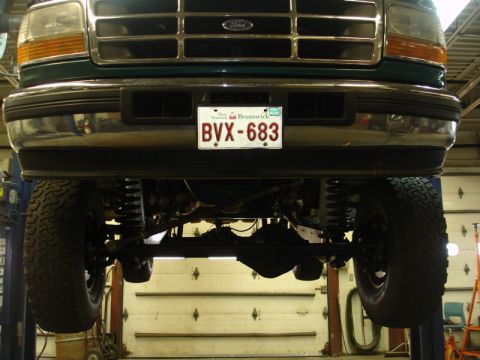 1996 Ford Bronco - Rear view of a 1996 Ford Bronco, showing the axle and suspension.