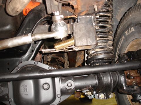 1996 Ford Bronco - Close-up of the front suspension and differential assembly on a 1996 Ford Bronco.