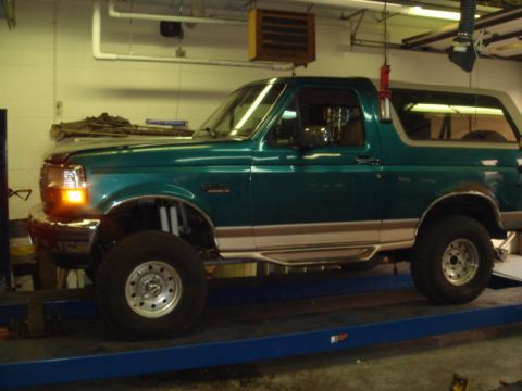 1996 Ford Bronco - This 1996 Ford Bronco is shown on a lift in a garage setting.