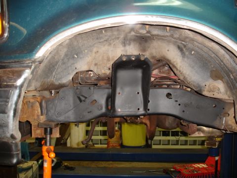 1996 Ford Bronco - Underbody view of a 1996 Ford Bronco, showing frame and suspension parts.