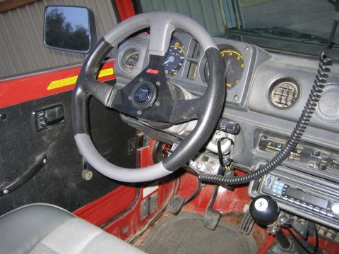 1987 Suzuki Samurai - Interior view of a 1987 Suzuki Samurai, the dashboard and driver's controls.