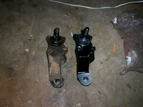 1993 Ford Bronco - old and new lower ball joints side by side