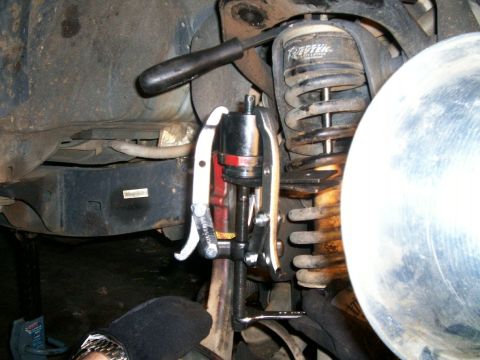 1993 Ford Bronco - Setting up 3-jaw puller to press new bj into knuckle