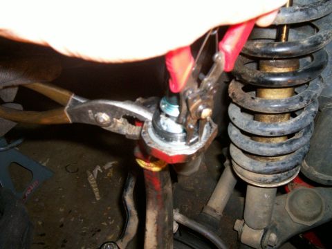 1993 Ford Bronco - Placing new snap ring onto upper bj and knuckle
