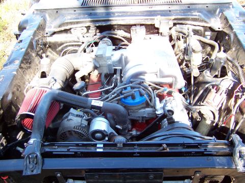 1964 Mercury Comet - Engine bay view shows an aftermarket air intake system and a blue distributor cap.