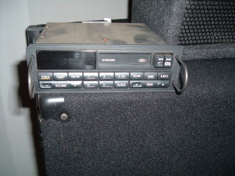 1995 Ford Bronco - This is a Ford car stereo unit, likely from the 1990s, with a multi-disc CD player.