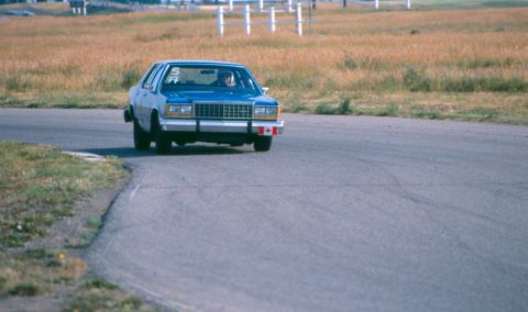1984 Ford LTD Crown Victoria - first picture anybody ever took, turn 7 (the chicane) at Race City in 2003. car was basically bone stock