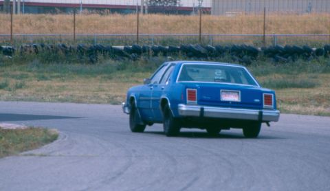 1984 Ford LTD Crown Victoria - same day going into turn 10, notice the difference in body roll