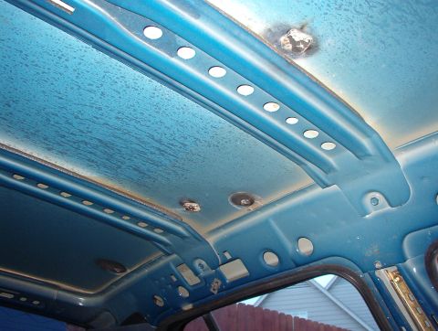 1999 Ford Crown Victoria - LHS welded patches, & roof bows used only in P71s. They're bolted & glued in, and they interfere with civilian headliners.