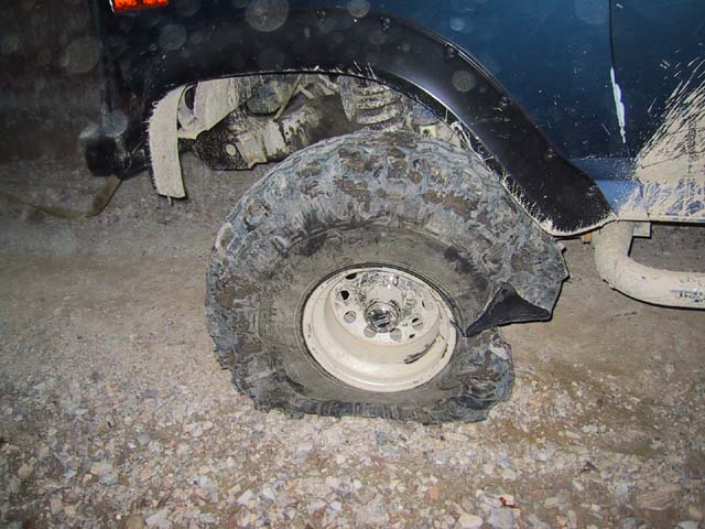 Alex's tire carnage---It's only a $300 new tire.