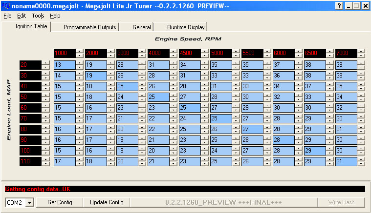 Computer screen displaying engine tuning software with a table of engine load and speed values