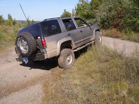 2000 Chevrolet Tahoe - This SUV is equipped for off-road use, with large tires and a lifted suspension.