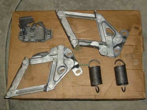1967 Ford Ranchero - Hood hinges and springs are laid out on a cardboard box, with a SuperMotors.net watermark visible.