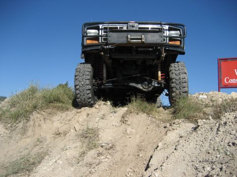 1986 Ford Bronco - This truck is equipped with a winch and bull bar, ready for off-road adventures.
