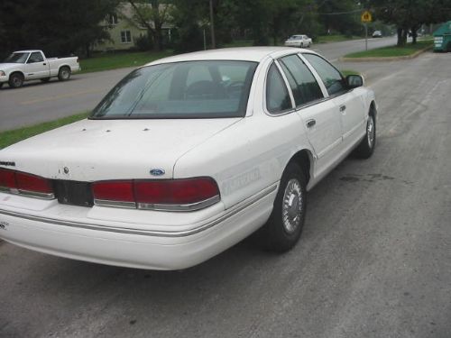 1996 Ford Crown Victoria parked on a street, rear quarter view