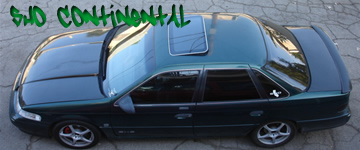 1993 Ford Taurus - This 1993 Ford Taurus SHO sedan features a sunroof and a distinctive green paint job.