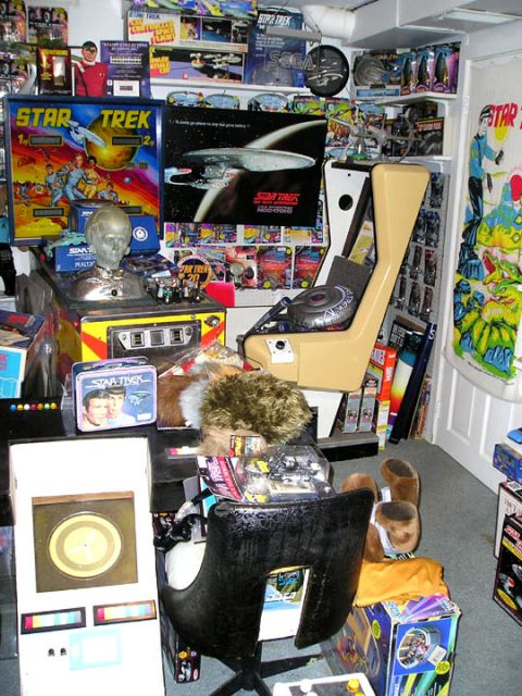 1966 Pontiac Fiero - A room filled with Star Trek memorabilia, including a pinball machine, a captain's chair replica, and numerous collectible items.