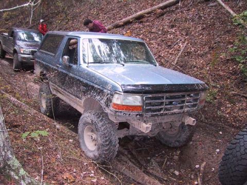 1995 Ford Bronco - Eric retrieving his hi-lift jack so that we can jack up a tree that had fallen over the trail.