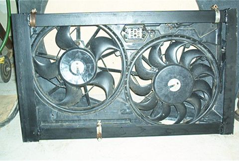 1986 Ford Bronco - A close-up view of a dual electric fan assembly, likely for a vehicle's cooling system.