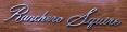 1970 Ford Ranchero - Close-up of a chrome 'Ranchero Squire' emblem, likely from a vehicle's interior or exterior trim.