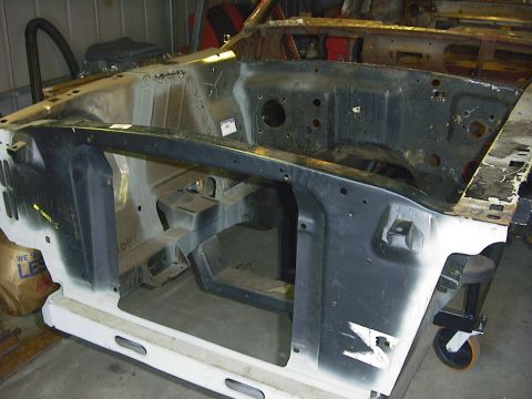 1990 Ford Mustang - This is the engine bay structure of a car, possibly undergoing restoration or repair.