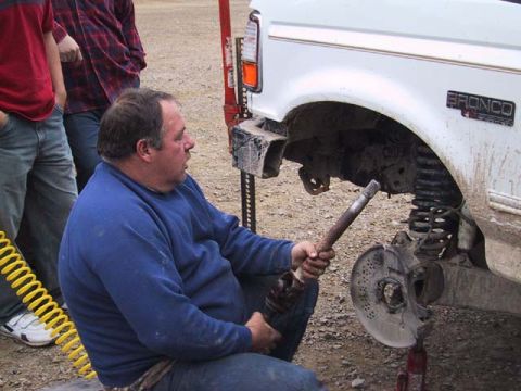 1995 Ford Bronco - Mike caressing his new axle shaft. We all turned our heads on this one.