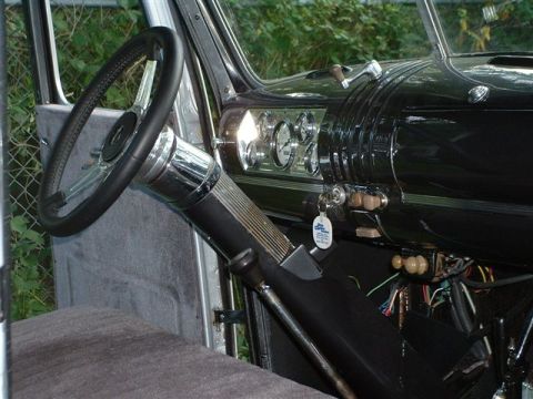 1946 Chevrolet C/K Pickup - Interior view of a 1946 Chevrolet C/K Pickup, highlighting the dashboard and steering column.