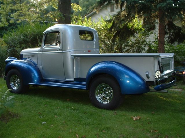 Silver and blue 1946 Chevrolet C/K Pickup truck, 3q-front view
