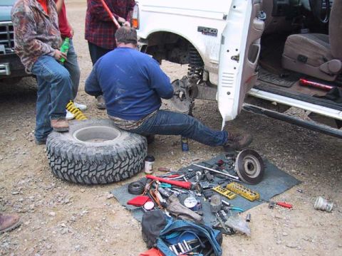 1995 Ford Bronco - Mike fixing his rig in the parking lot.