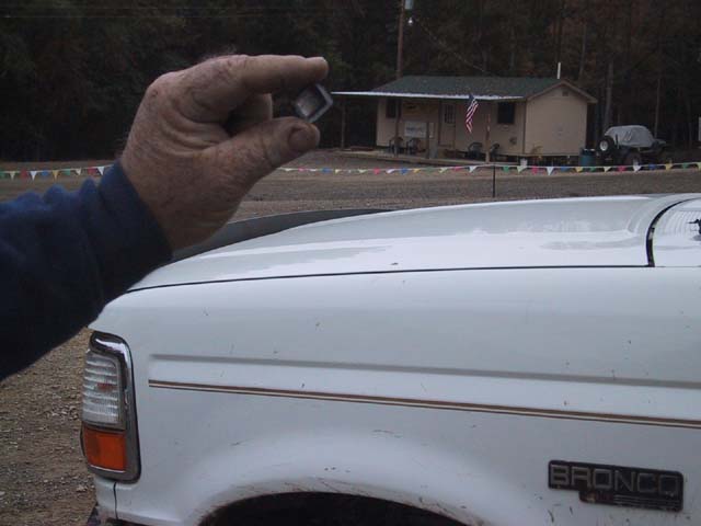 This is a pic of the u-joint cap out of Mikes bronco that broke.  Notice we are not even out of the parking lot yet.