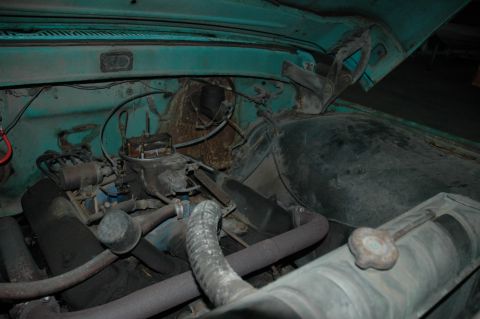 1963 Ford F-250 - Close-up of the engine compartment in a 1963 Ford F-250 truck.