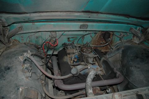 1963 Ford F-250 - Close-up view of the engine compartment, showing various engine components and wiring.