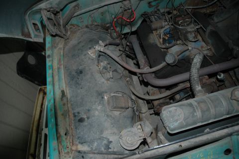 1963 Ford F-250 - Engine bay details of a 1963 Ford F-250, showing the engine and associated components.