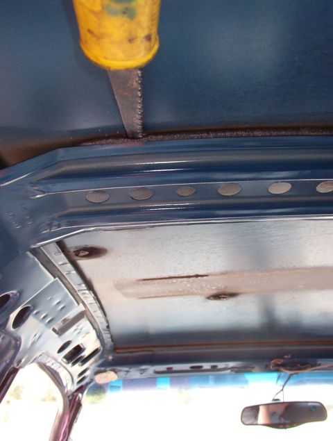 1999 Ford Crown Victoria - This foam adhered a little more to the roof than the other, but it comes away easily.
