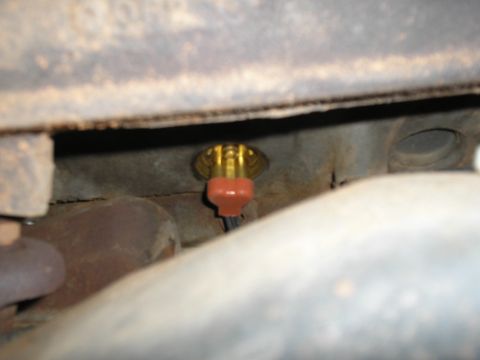 1990 Ford Bronco - the Block heater. last freeze plug hole on the passenger side