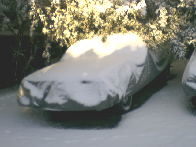 1973 Ford Ranchero covered in snow, 3q-front view