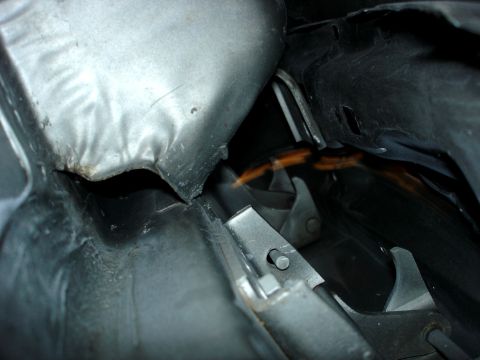 1979 Ford Bronco - Detail shot of damaged or disassembled vehicle components, with a website logo in the corner.