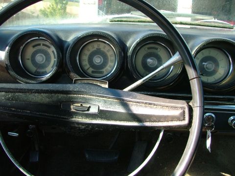 1969 Ford Ranchero - Dashboard view of a 1969 Ford Ranchero, showing the instrument cluster and steering wheel.