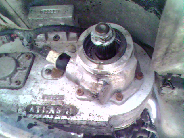 Close-up of a transfer case component with 'ATLAS' visible, and a digital counter above
