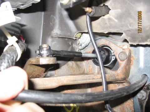 1994 Ford Bronco - Close-up of the clutch master cylinder linkage in a 1994 Ford Bronco.
