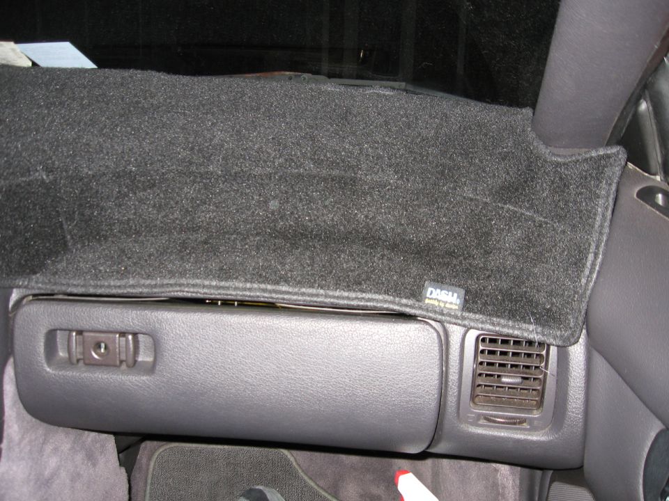 Interior dashboard with dash cover and vent