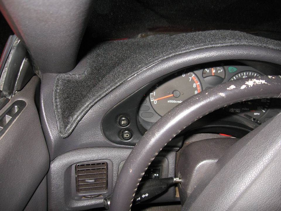 1991 Mitsubishi 3000GT interior dashboard with tachometer and steering wheel